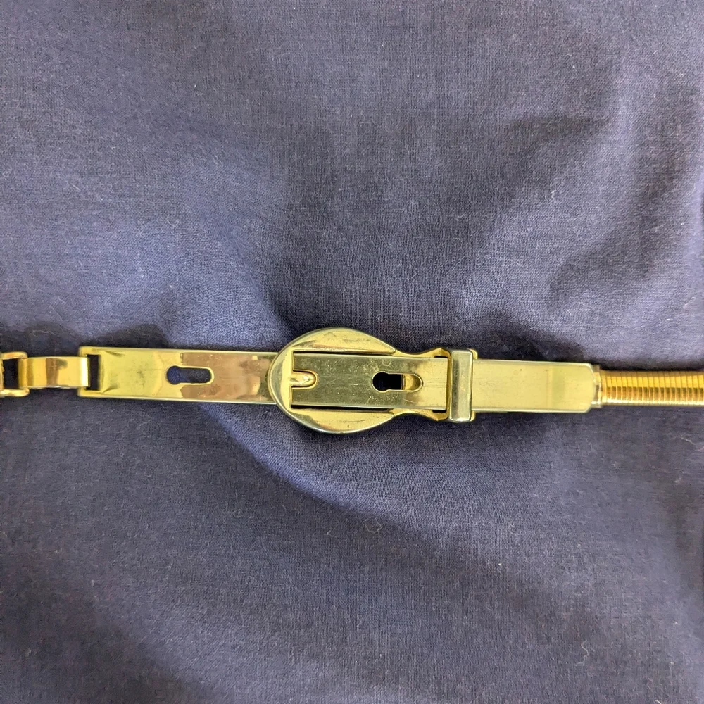 Vintage 70's gold serpentine skinny stretch belt, Size S
